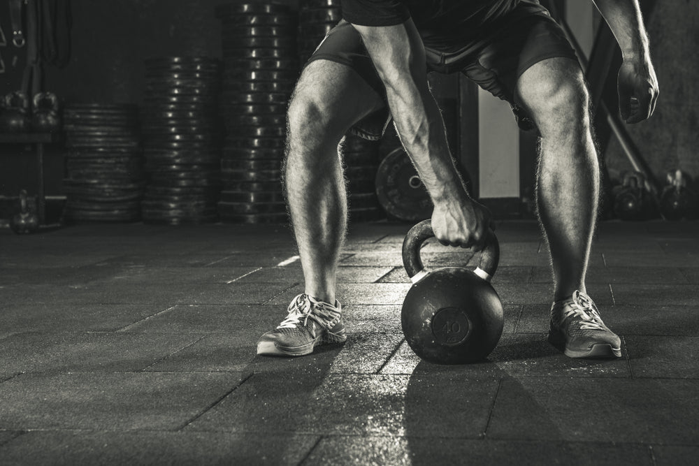 Crossfit kettlebell training in gym