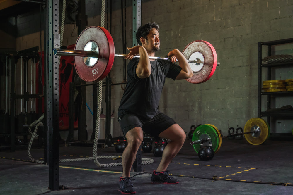 Is a heavy dumbbell squat (holding onto the shoulders like a front squat)  better than a barbell squat? - Quora