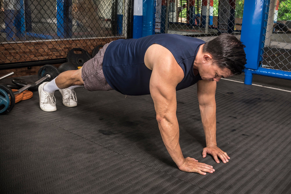 Wide vs Close Grip Push Ups: Which is Better? - Steel Supplements