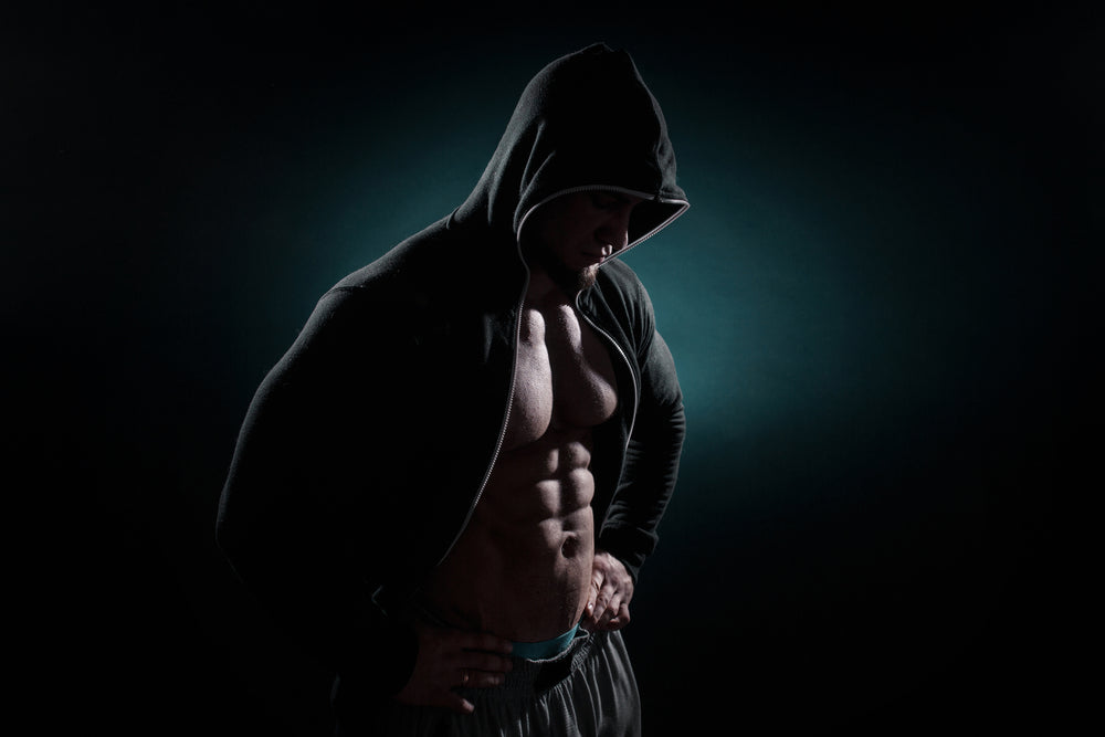  handsome muscular bodybuilder in hoodie 