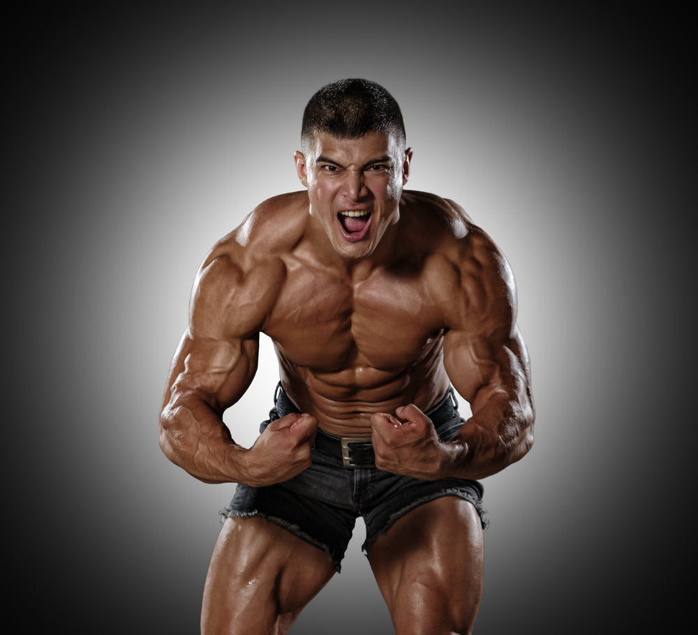 Strong man does landmine exercises, workout with barbell.