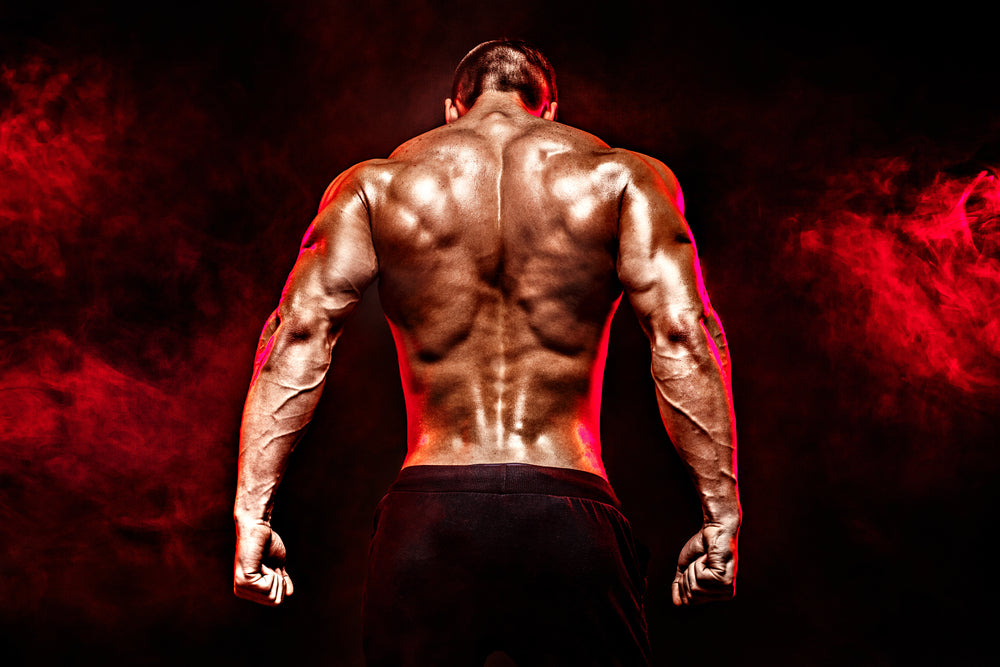 fit man showing off thick back muscles